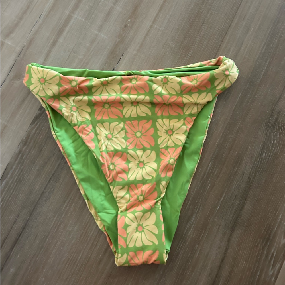 dippin daisy’s bathing suit, bottoms, high waisted barley cheeky not really!
